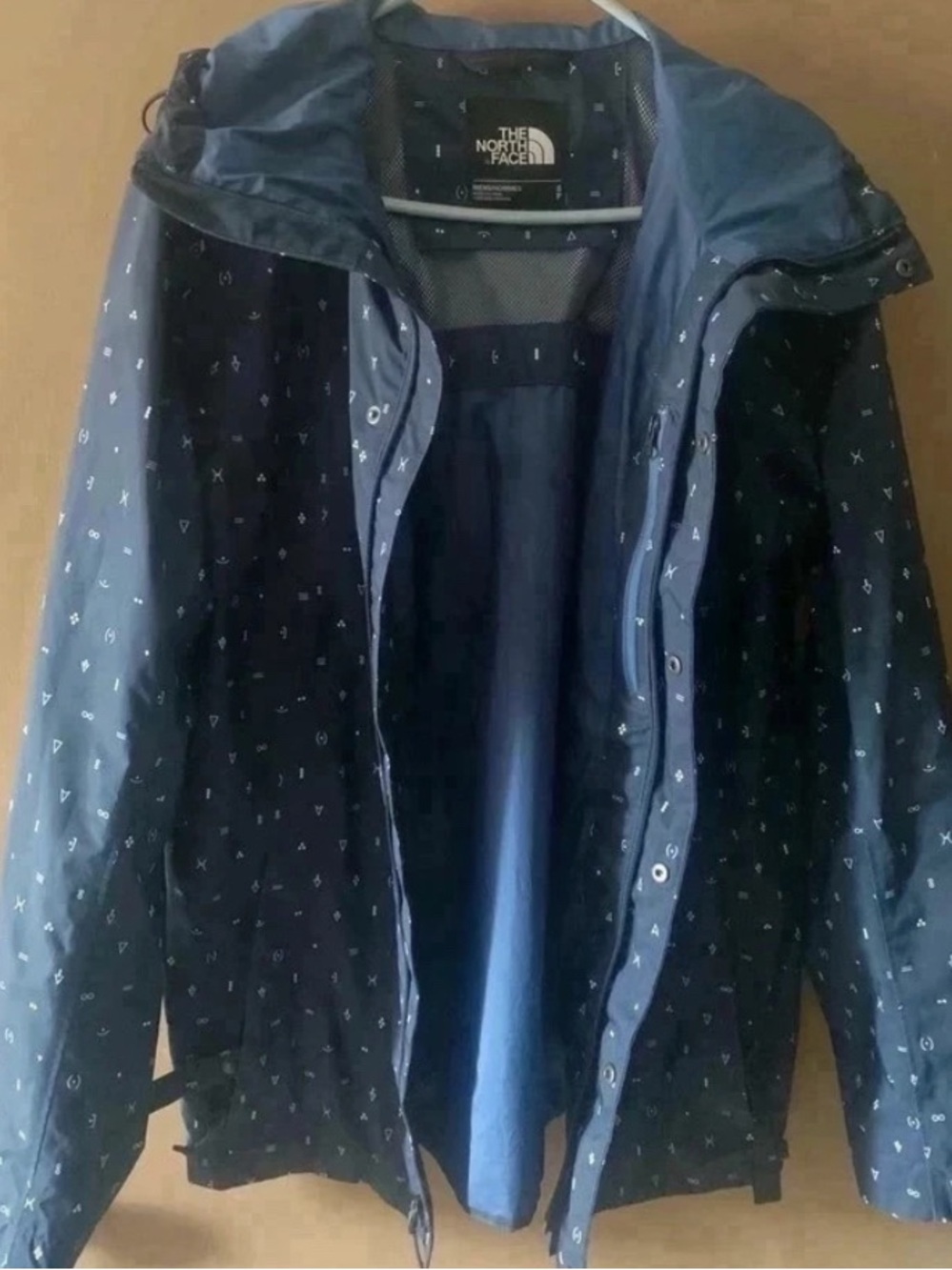 The North Face Navy Hooded Rain Jacket with Subtle Print